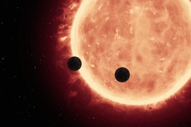 20160721084027-an-artists-depiction-of-planets-transiting-a-red-dwarf-star-in-the-trappist-1-system.jpeg
